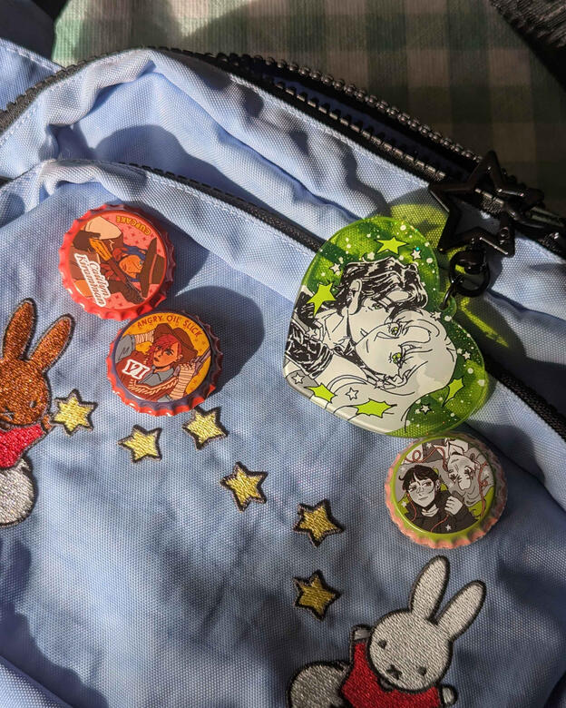 bottle cap pins and green yuri keychain